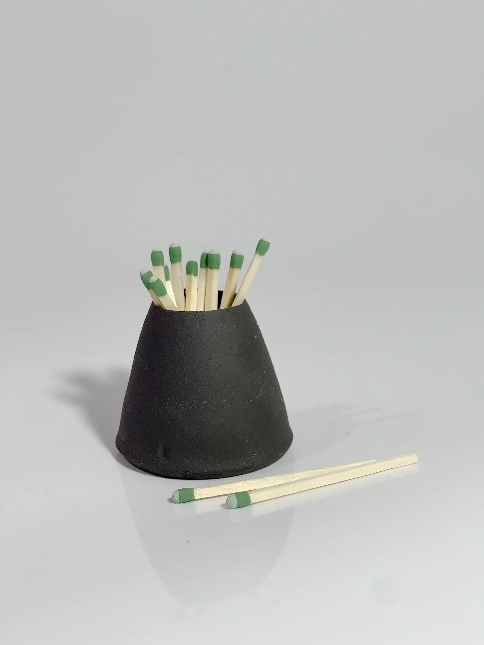 Black Clay Candle Match Striker